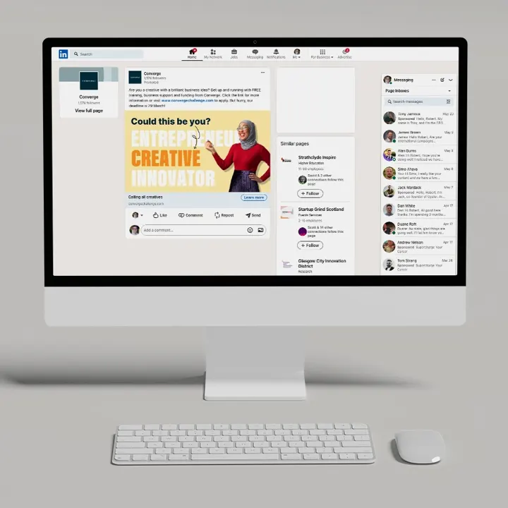 A computer screen showing a LinkedIn ad for the Converge Challenge, featuring a woman in a lab coat pointing to the headline "Could this be you?" to encourage innovative creators to enter.