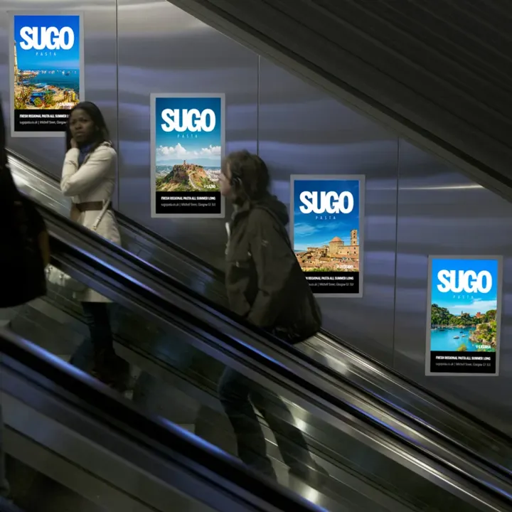 Sugo Pasta - Posters above an escalator