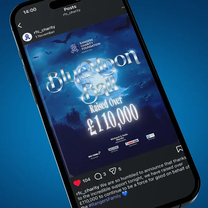 A phone showing a Rangers Charity Foundation post: the Blue Moon Ball raised over £110,000