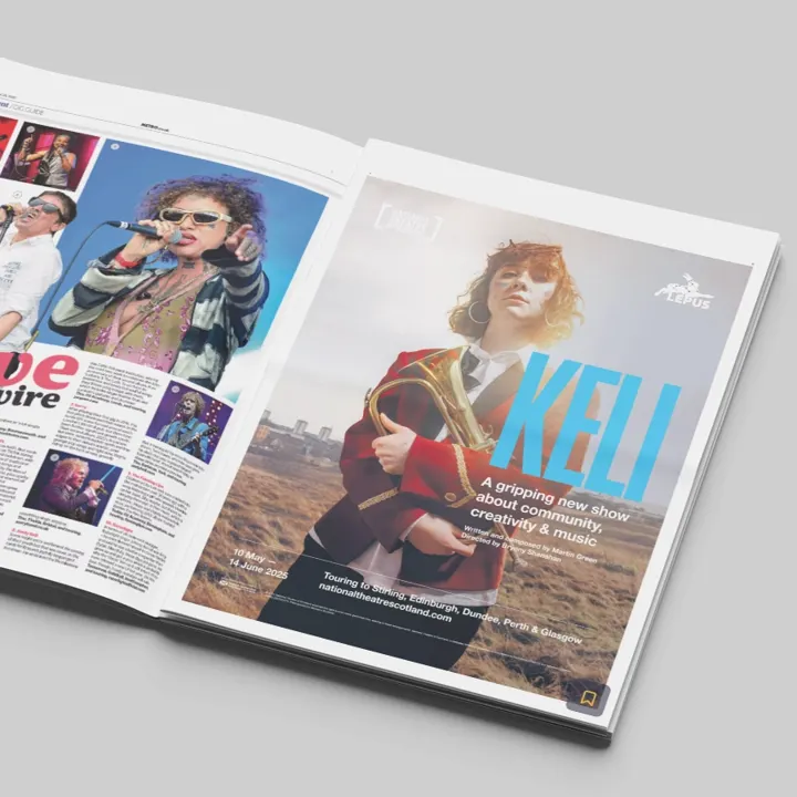 An open magazine with a National Theatre of Scotland advert for 'Keli'