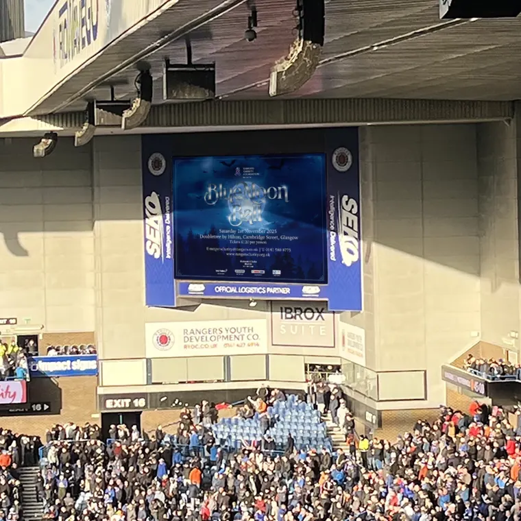 The big screen at Ibrox Stadium showing the Rangers Charity Foundation Blue Moon Ball