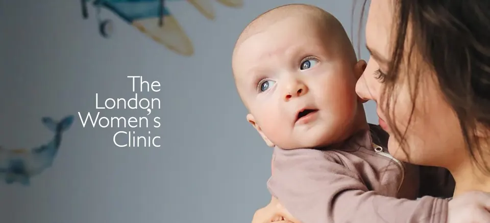 A banner image on the London Women's Clinic website showing a mother embracing her baby