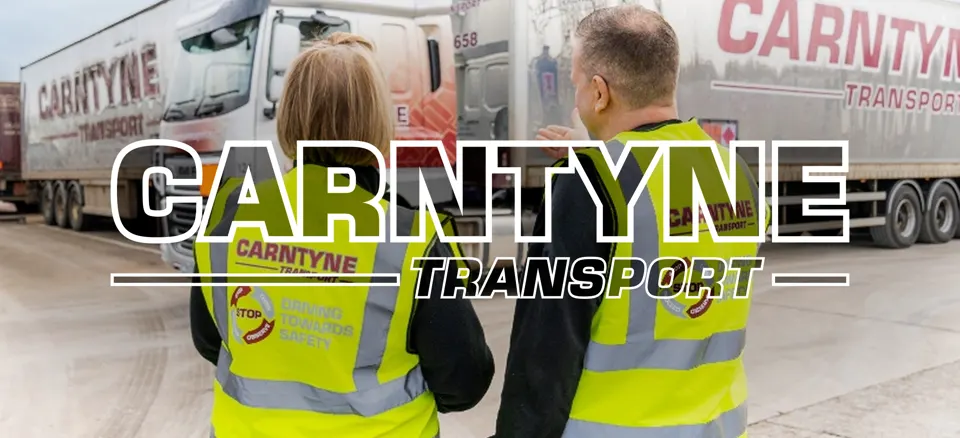 Carntyne Transport - Workers with Trucks in the background