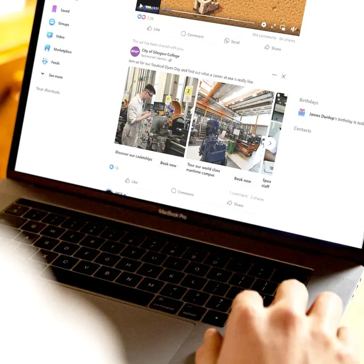 A laptop showing City of Glasgow College Facebook adverts for its Open Day