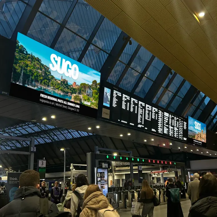 Sugo Pasta advertisement on the Queen Street Departure Boards
