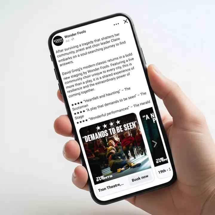 A hand holding a phone showing a Wonder Fools Facebook advert for 'The Events' with four-star reviews