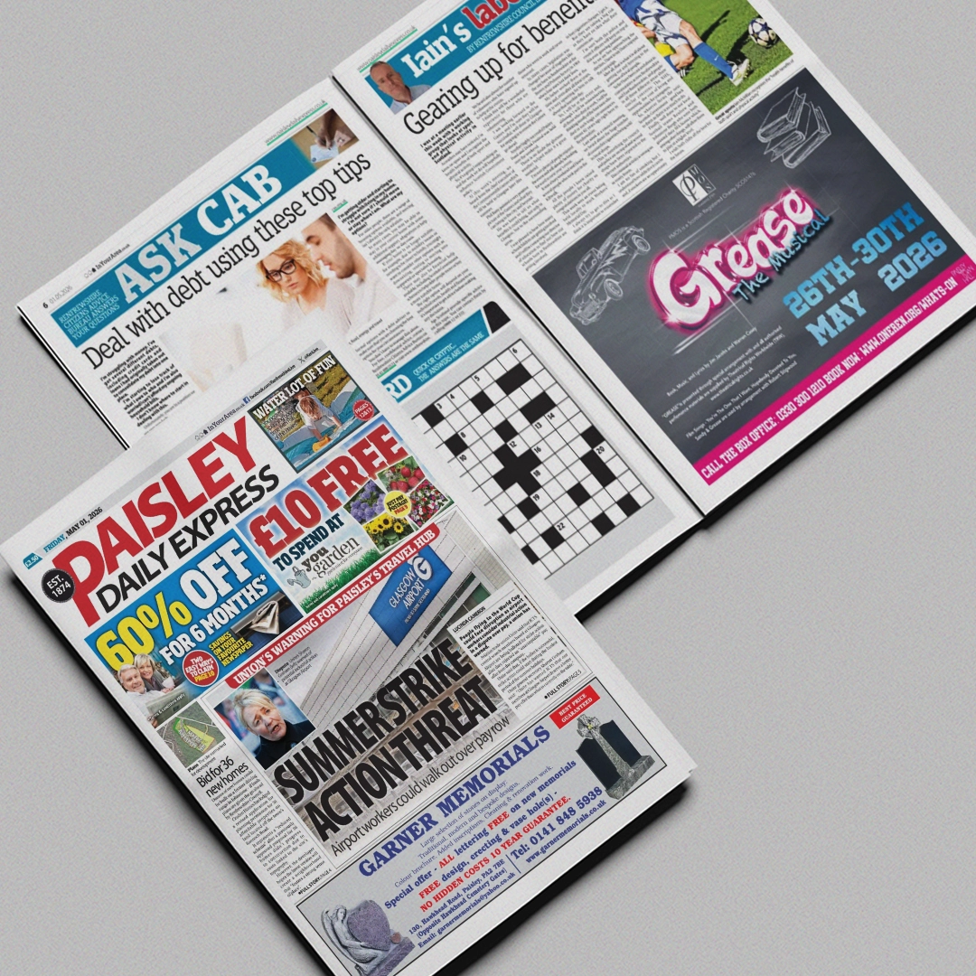 A Paisley Daily Express newspaper open at a 'Grease the Musical' advert